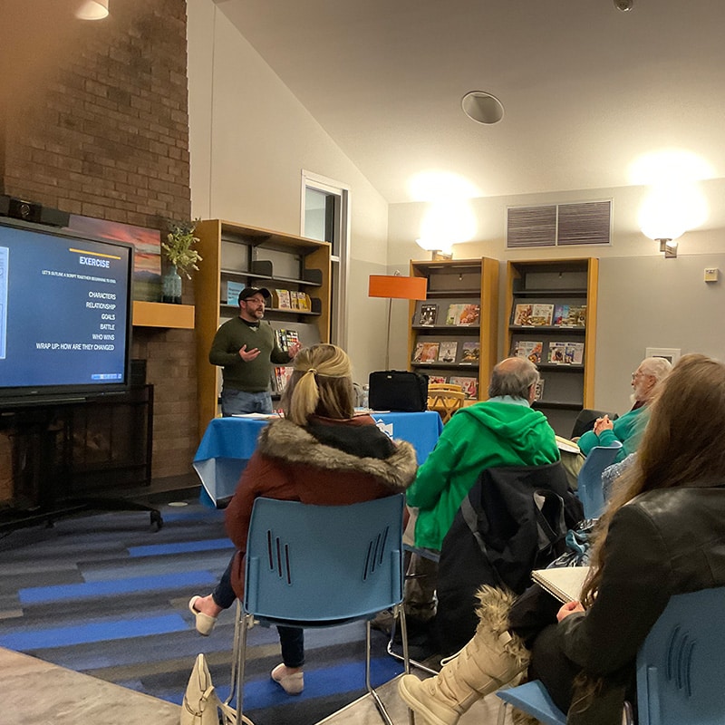 Group of adults participating in a training class at the Glenn A Jones MD Memorial Library adult programs