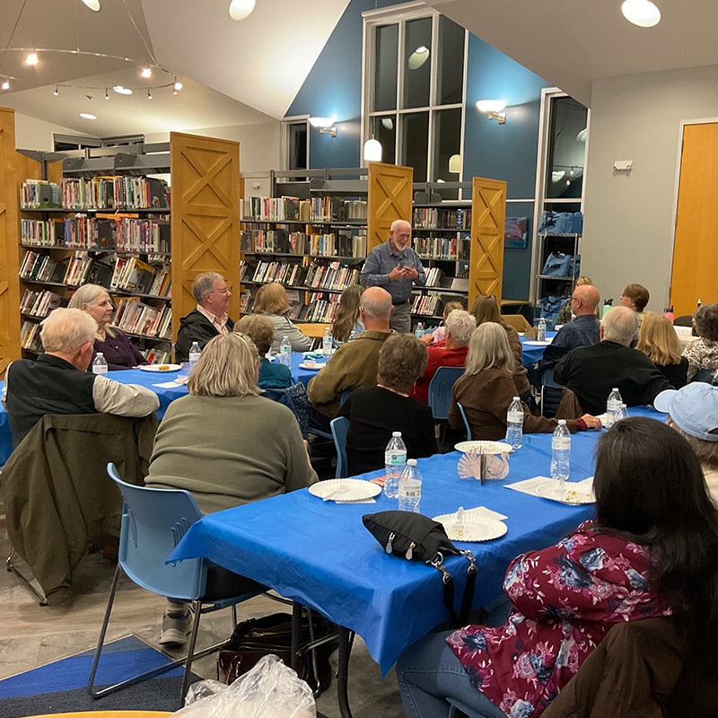 A group of adults gathered for an informational session at the Glenn A Jones MD Memorial Library adult programs