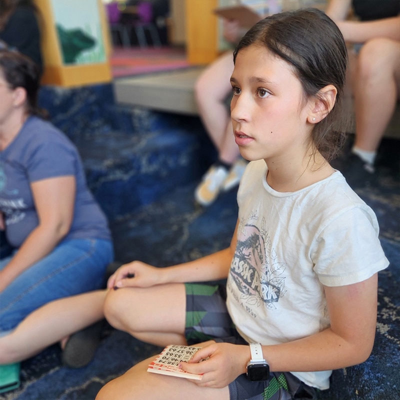 Playing bingo at the Glenn A Jones MD Memorial Library Teen Programs